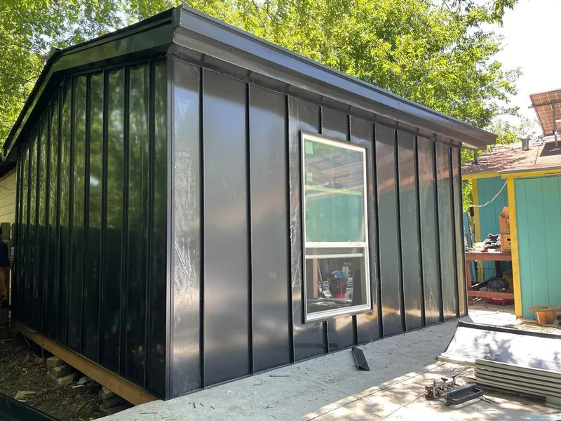 Black standing seam metal wall panels for Roof Inspection in Hudson